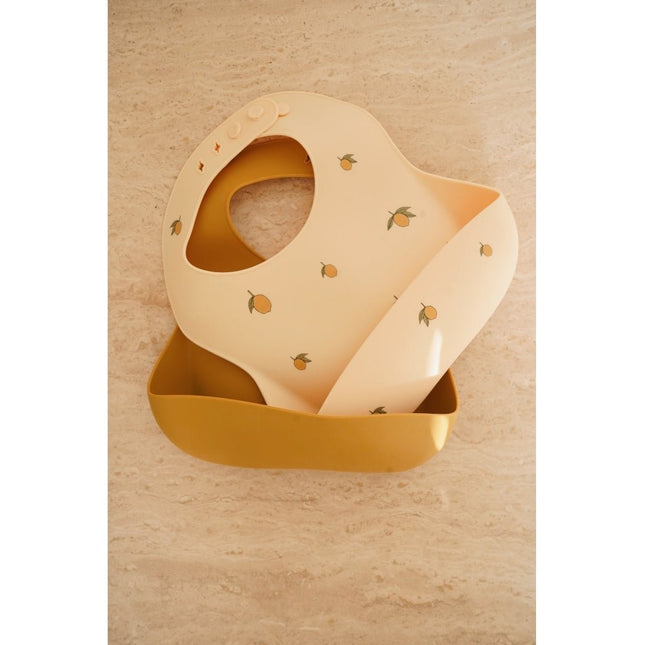 Konges Slojd Slabbetje Lemon/Almond 2st koop je bij Babywinkel