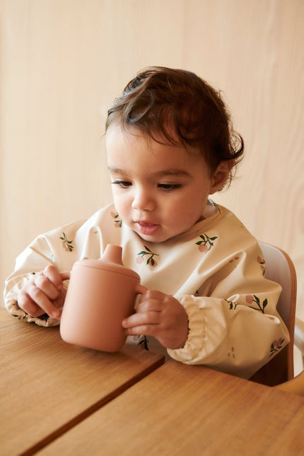 Liewood Slabbetje Merle Peach/Sea Shell koop je bij Babywinkel