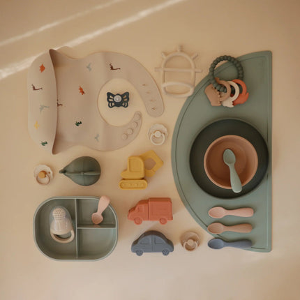 Mushie Babylepel Natural Shifting Sand koop je bij Babywinkel