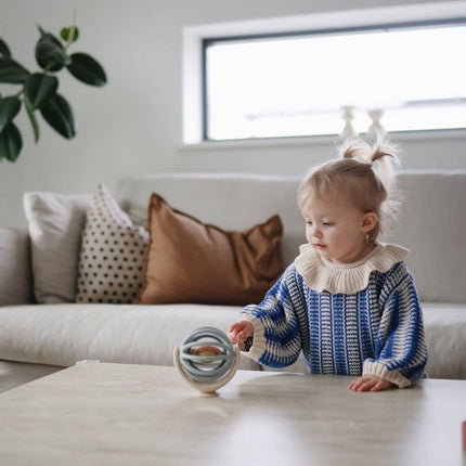 Mushie Spinner Bal met zuignap koop je bij Babywinkel
