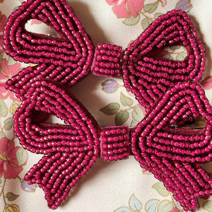 <tc>Konges Slojd</tc> Lot de 2 pinces à cheveux à nœud nacré Sangria